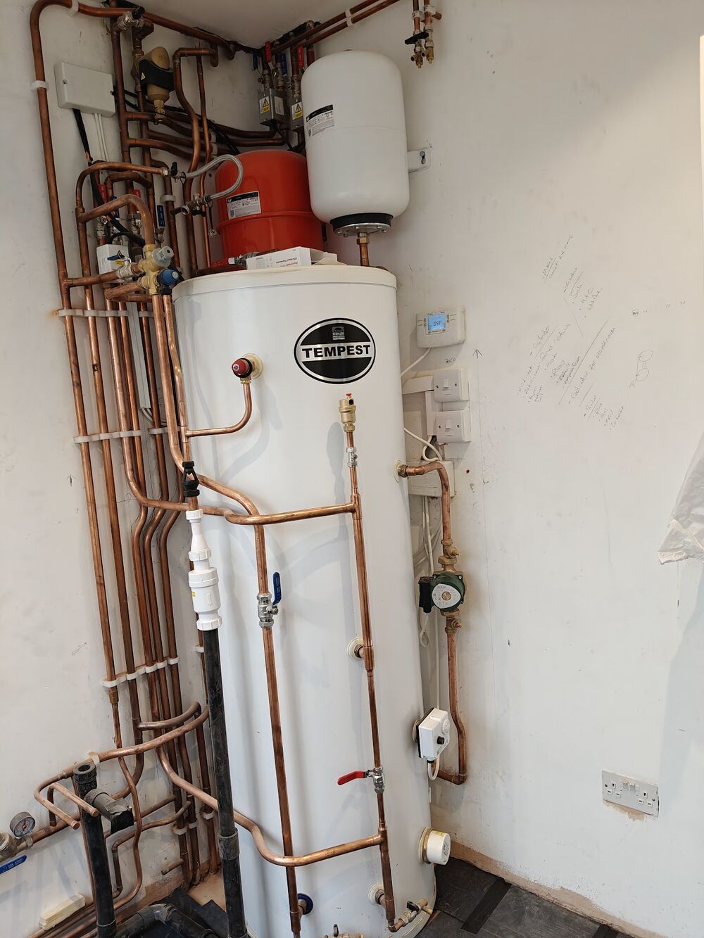 Unvented hot water cylinder installed by FM Plumbing Solutions with copper pipework